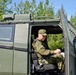 Japanese General Rides Arctic Combat Vehicle during JBER Tour