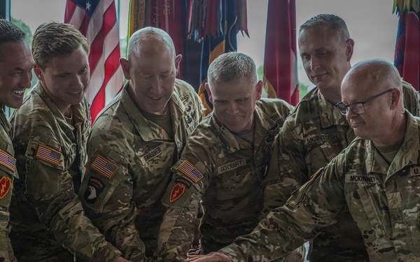 Senior leaders of the 101st Airborne Division (Air Assault) participate in the ceremonial cake cutting