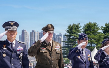 Allies salute together during memorial ceremony tribute