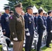 Attendees stand together for Korean national anthem