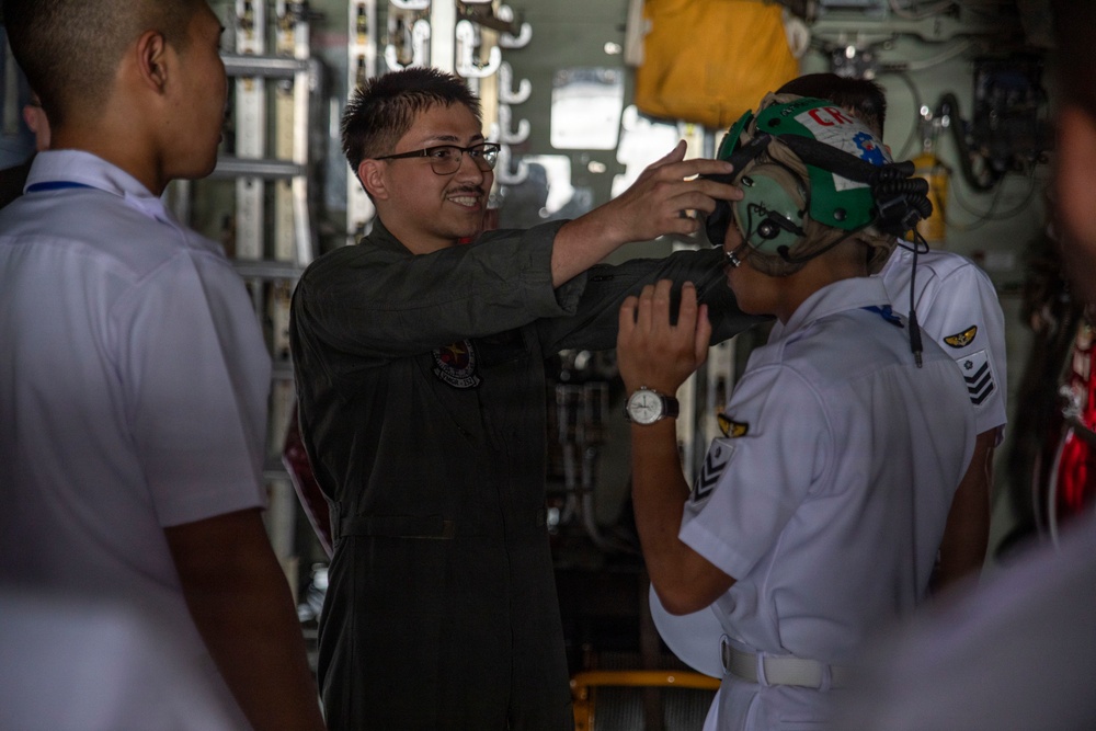 JMSDF Cadets Tour VMGR-152 KC-130J Aircraft at MCAS Iwakuni