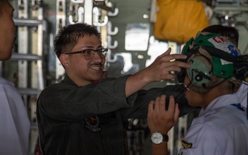 JMSDF Cadets Tour VMGR-152 KC-130J Aircraft at MCAS Iwakuni
