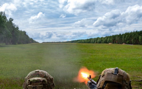 Precision under pressure, Apache Troop Soldiers put steel on target during M240B qualification.