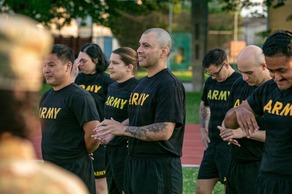 HHC, 207th Military Intelligence Brigade (Theater) conducts historical Army Physical Fitness Test (APFT) during Army Heritage Month