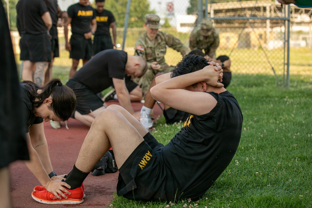 HHC, 207th Military Intelligence Brigade (Theater) conducts historical Army Physical Fitness Test (APFT) during Army Heritage Month