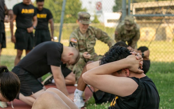 HHC, 207th Military Intelligence Brigade (Theater) conducts historical Army Physical Fitness Test (APFT) during Army Heritage Month