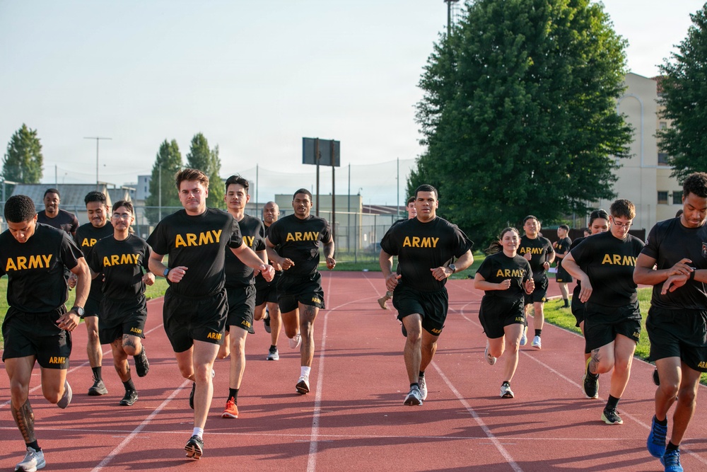 HHC, 207th Military Intelligence Brigade (Theater) conducts historical Army Physical Fitness Test (APFT) during Army Heritage Month