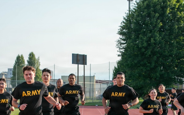 HHC, 207th Military Intelligence Brigade (Theater) conducts historical Army Physical Fitness Test (APFT) during Army Heritage Month