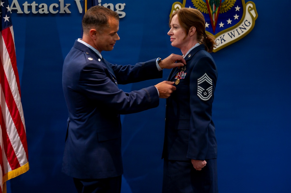 Terry Presents Meritorious Service Medal to Carroll
