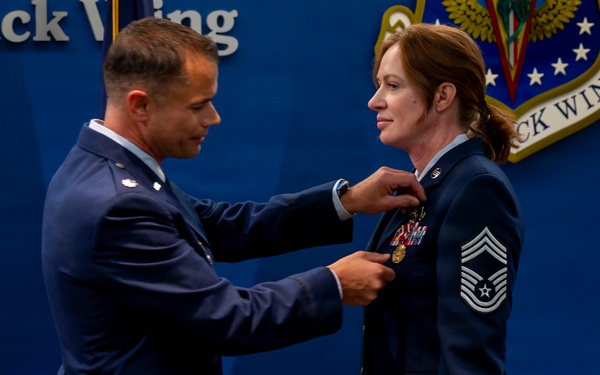Terry Presents Meritorious Service Medal to Carroll