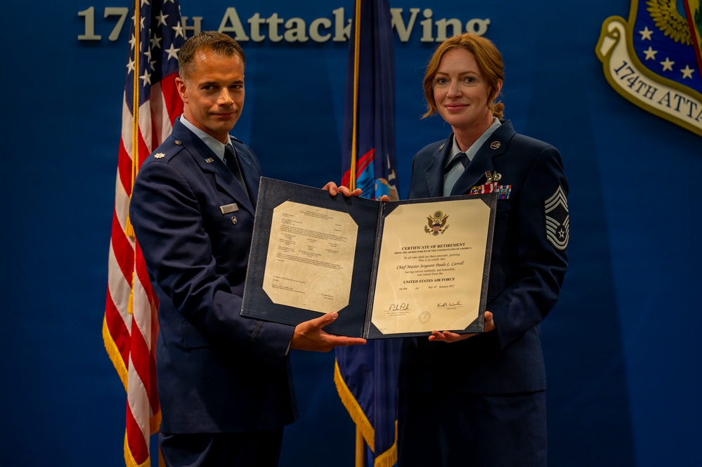Terry Presents Retirement Certificate to Carroll