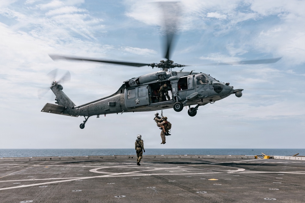 11th MEU Marines, Sailors Conduct Hoist Training Aboard USS Portland