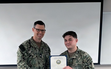 LS2 Jones reenlists