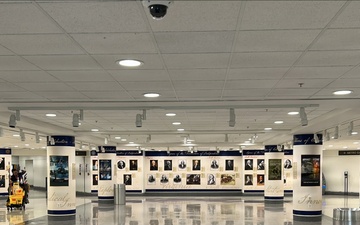 Pillar posters are on display in a Pentagon apex.