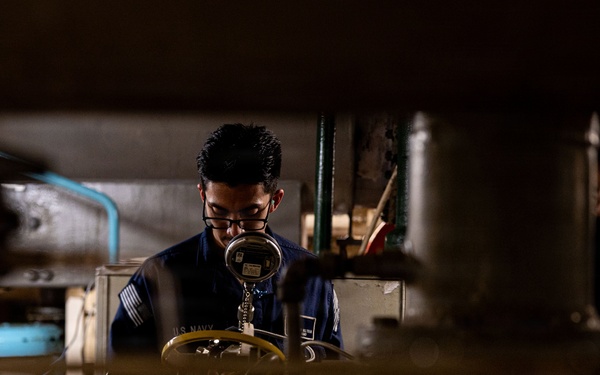 U.S. Sailors calibrate equipment