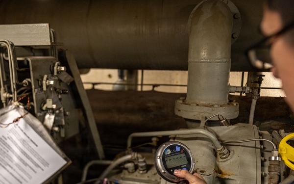 U.S. Sailors calibrate equipment