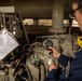 U.S. Sailors calibrate equipment