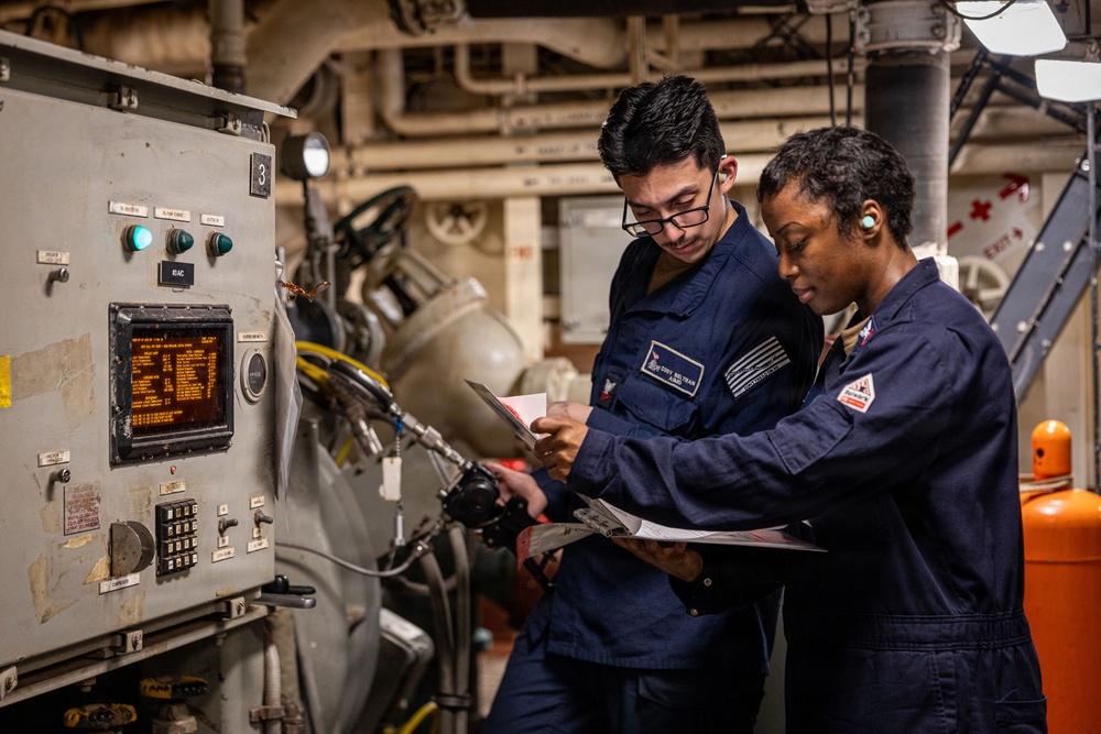 U.S. Sailors calibrate equipment