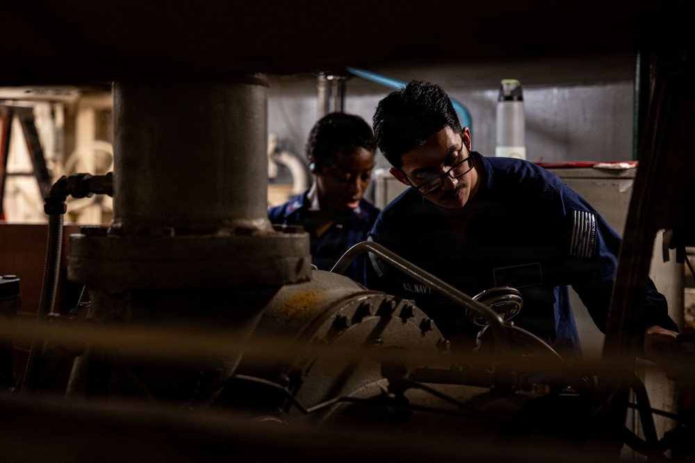 U.S. Sailors calibrate equipment