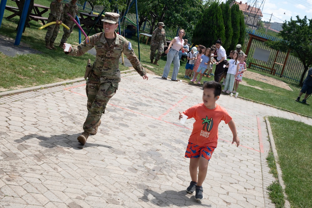 KFOR RC-E Soldiers participate in end-of-school field day at Prishtina High School
