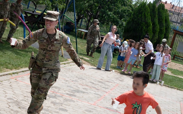 KFOR RC-E Soldiers participate in end-of-school field day at Prishtina High School