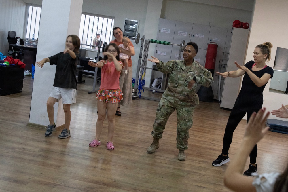 KFOR RC-E Soldiers participate in end-of-school field day at Prishtina High School