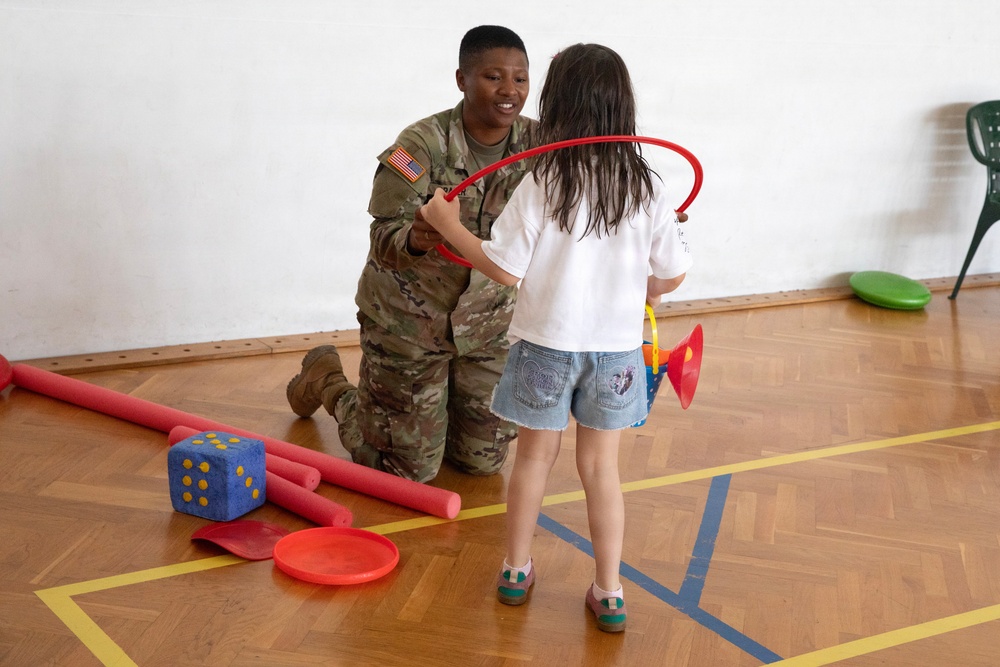 KFOR RC-E Soldiers participate in end-of-school field day at Prishtina High School