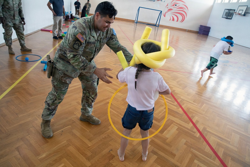 KFOR RC-E Soldiers participate in end-of-school field day at Prishtina High School