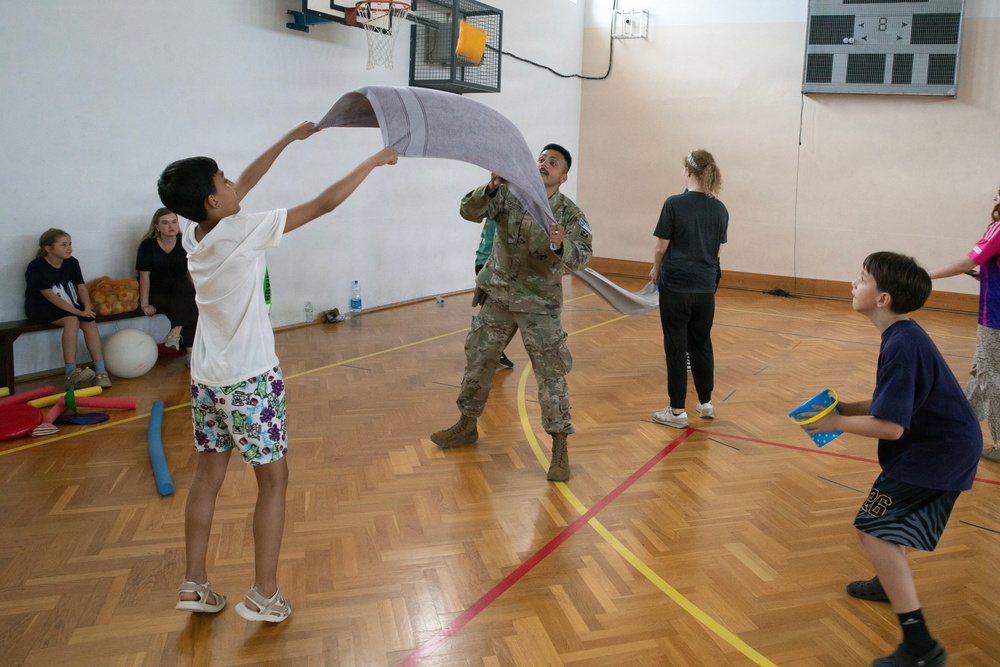 KFOR RC-E Soldiers participate in end-of-school field day at Prishtina High School