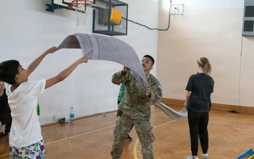 KFOR RC-E Soldiers participate in end-of-school field day at Prishtina High School