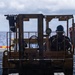 USS Iwo Jima Sailors Move Ordnance