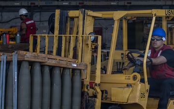 USS Iwo Jima Sailors Move Ordnance