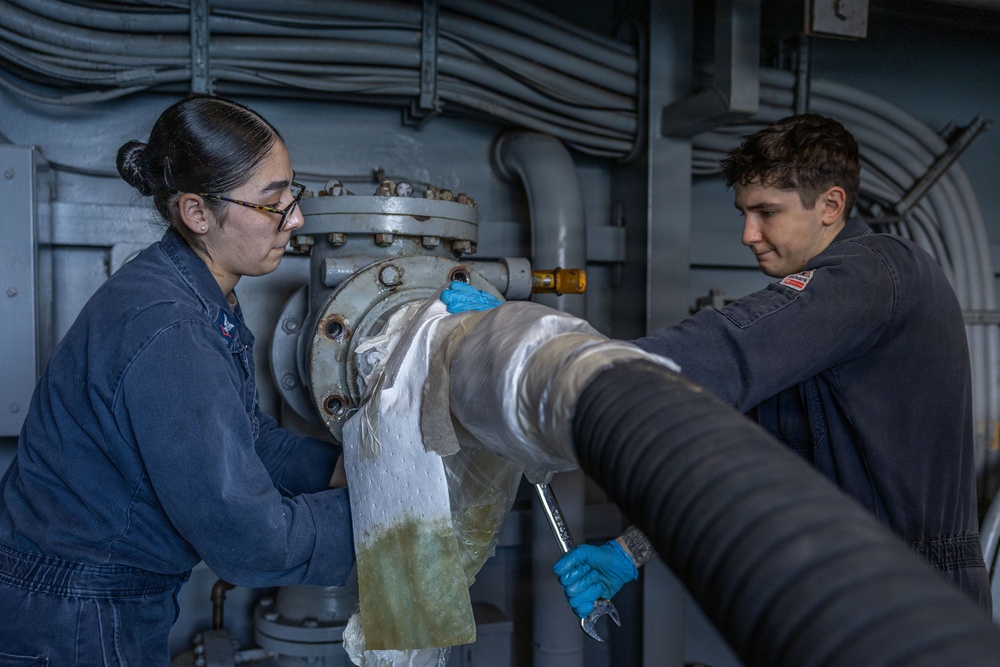 USS Iwo Jima Sailors Set Up Refueling Station for Refeuling In Port