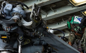 MH-60S Sea Hawks maintenance aboard USS Iwo Jima