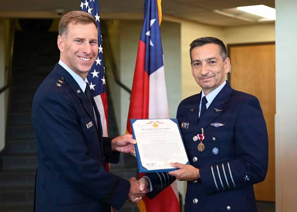 AFSOUTH awards SICOFAA undersecretary Air Force Meritorious Service Medal