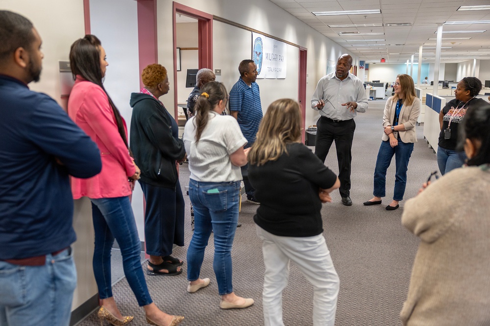 AMPO employees learn reserve pay, tour DFAS