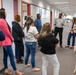 AMPO employees learn reserve pay, tour DFAS