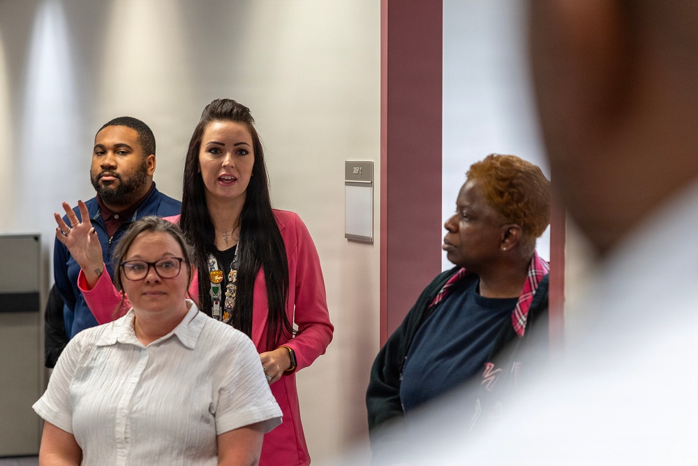 AMPO employees learn reserve pay, tour DFAS