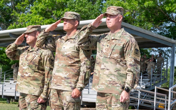 Passing the colors, 1st Engineer Brigade bids farewell to Glaspell and welcomes Kieser