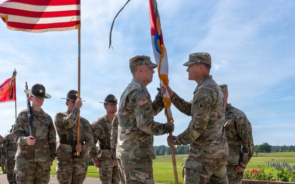 Passing the colors, 1st Engineer Brigade bids farewell to Glaspell and welcomes Kieser