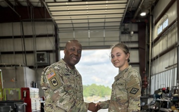 871st Troop Command Commander Presents Coin