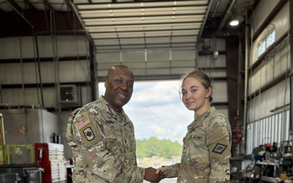 871st Troop Command Commander Presents Coin