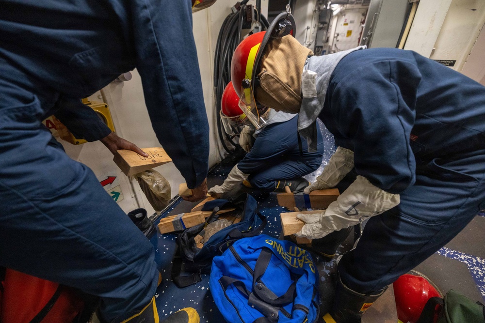 USS Mustin conducts a general quarters drill