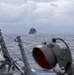 USS Mustin conducts a replenishment-at-sea with USNS Wally Schirra