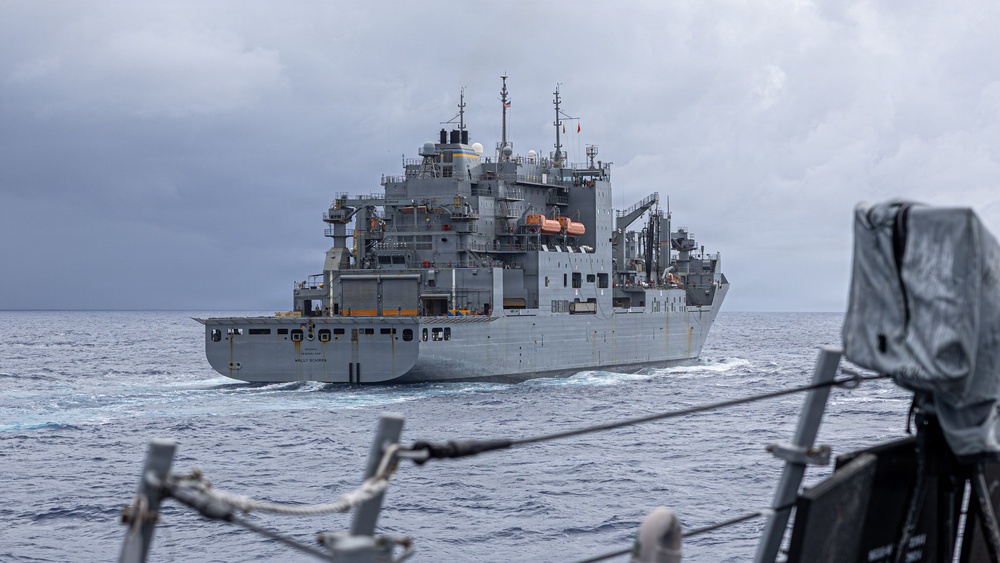 USS Mustin conducts a replenishment-at-sea with USNS Wally Schirra