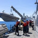 USS Mustin conducts an integrated training team drill