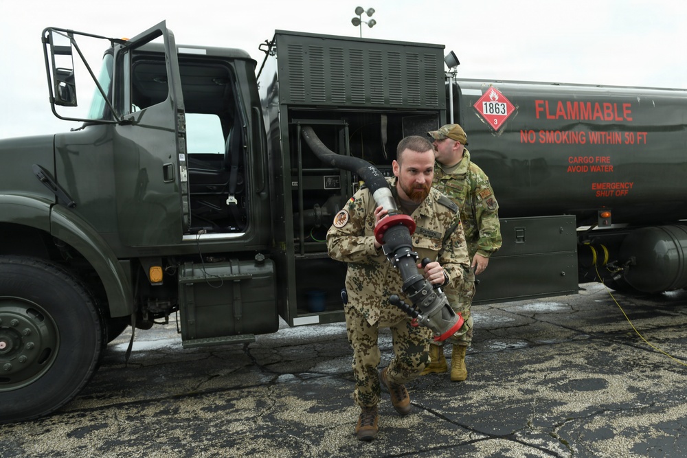 Fueling Partnership: German and 110th Logistics Readiness Squadron Airmen Refuel UH-60 Black Hawk
