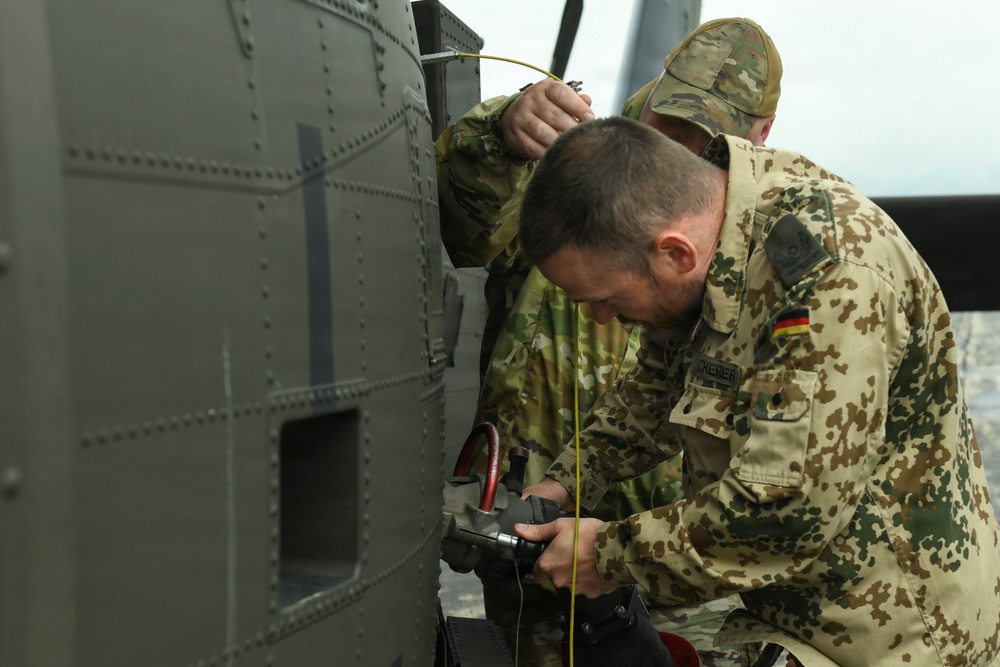 Fueling Partnership: German and 110th Logistics Readiness Squadron Airmen Refuel UH-60 Black Hawk