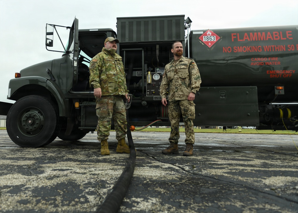 Fueling Partnership: German and 110th Logistics Readiness Squadron Airmen Refuel UH-60 Black Hawk