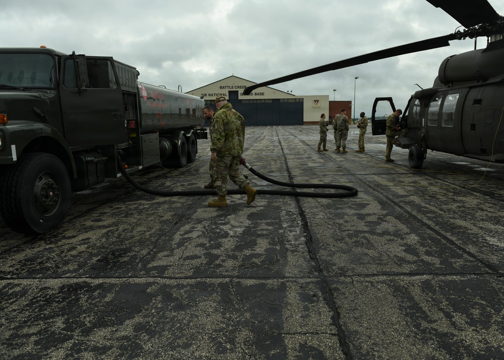 Fueling Partnership: German and 110th Logistics Readiness Squadron Airmen Refuel UH-60 Black Hawk